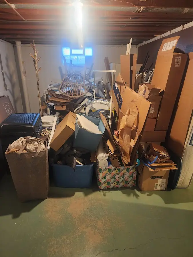 Roll-off dumpster container at job site for 8 Yard Dumpster Rental in Hutchinson